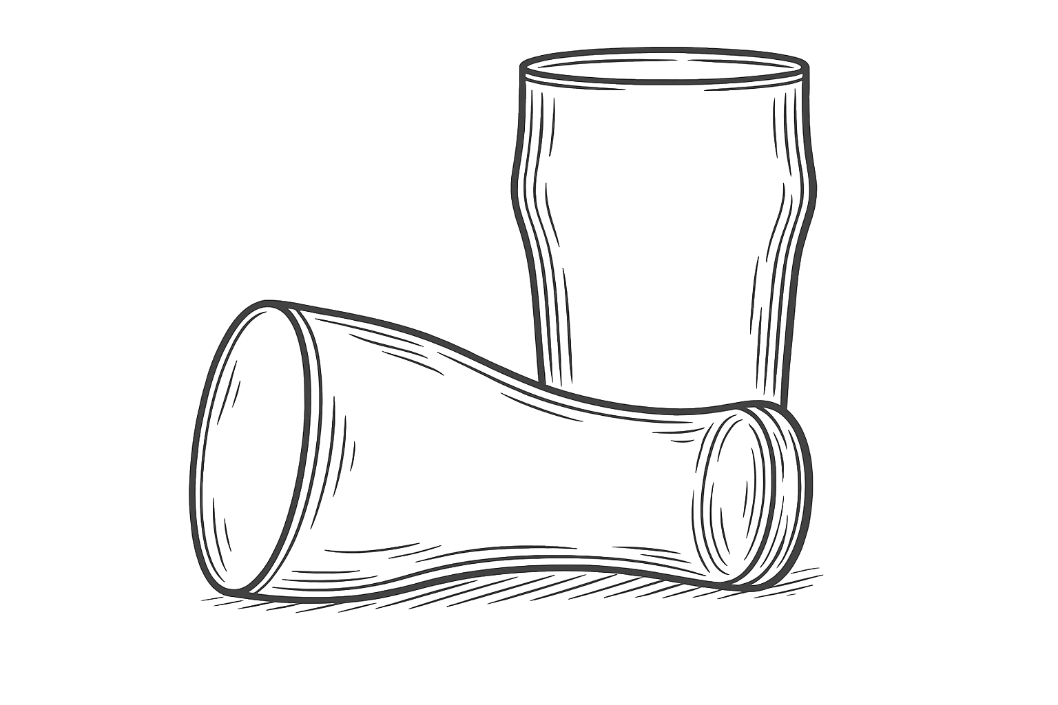 An empty beer glass tipped on its side